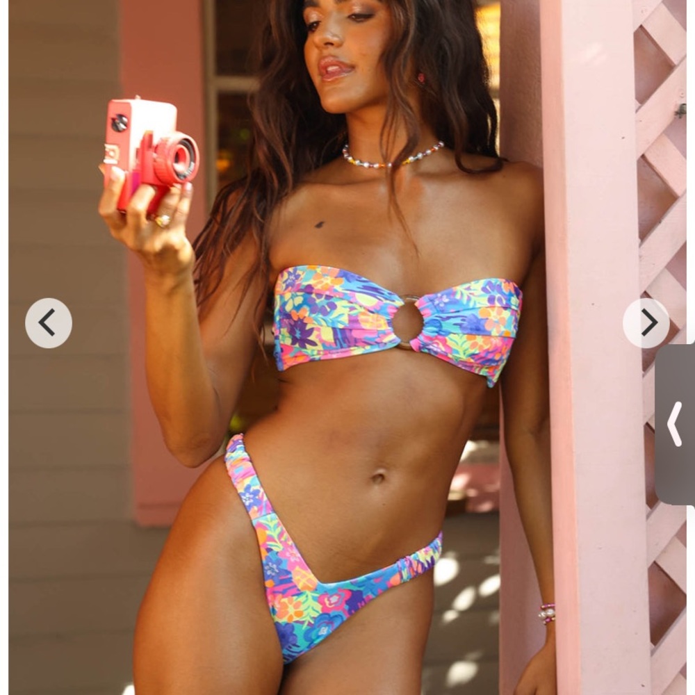 Kulani Kini-never worn perfect condition just too small!!